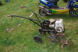 A Briggs & Stratton Wolseley Merry Tiller rotavator 2HP, good compression, (unable to start,