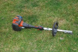 A Husqvarna 525 LK strimmer engine, no attachments. Good compression.