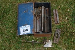 A tool box including; dial gauge stand, etc.