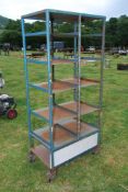 Steel shelving on wheels 71" high x 31" wide x 20" deep.