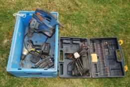 A large electric drill, Titan rechargeable drill and a breaker.