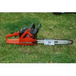 A Dolmar PS-410 chainsaw with chain-brake. Good compression.