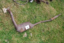 A down-swept tractor exhaust, possibly for a Fordson Major.