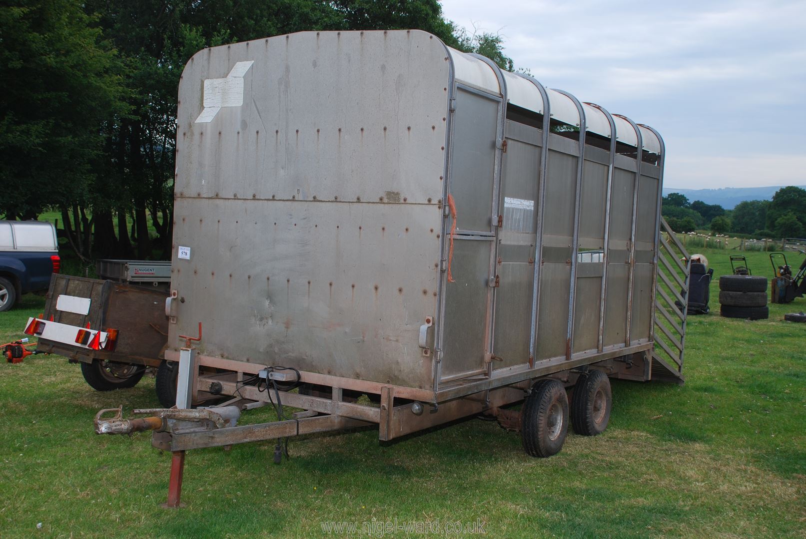 An Ifor Williams twin axle stock Trailer with chequer plate floor, loading gates present.