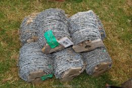 Eight rolls of barbed wire.