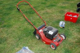 A rotary lawn mower with Briggs & Stratton engine.