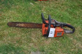 A Stihl 010 AV chainsaw with chain-brake, good compression.