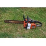 A Stihl 010 AV chainsaw with chain-brake, good compression.