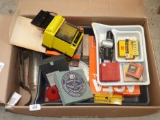 A box of old darkroom equipment.