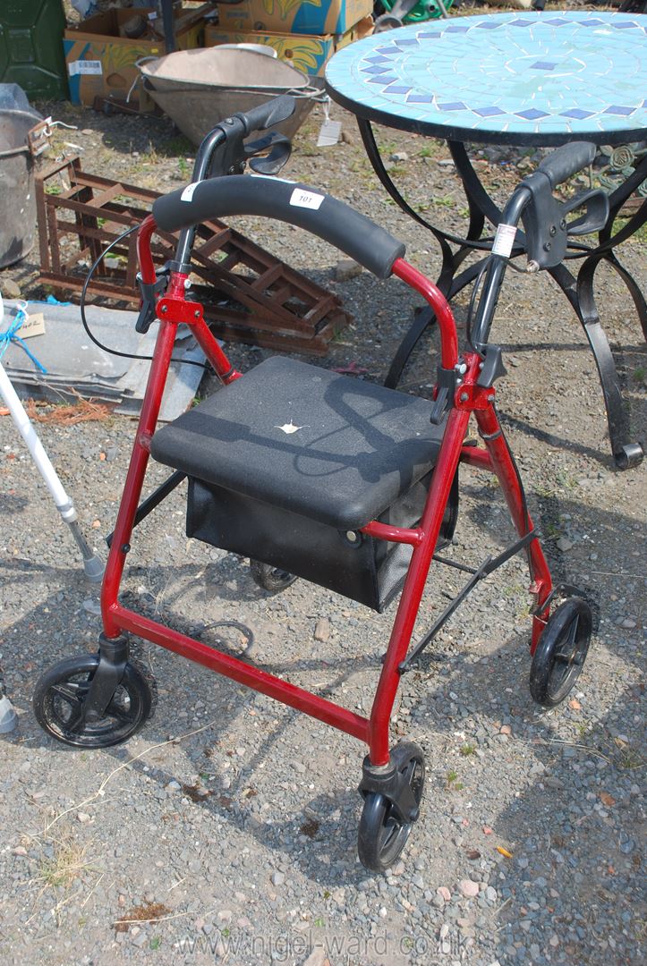 A drive mobility walker with brakes.