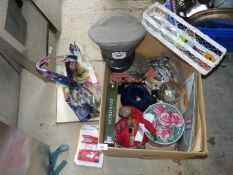 A box of miscellaneous including E.T model, WWII in colour DVDs, etc.