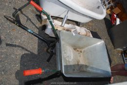 Galvanised wheelbarrow with solid tyre.