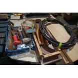 A roll of armoured cable, tray of assorted chisels, lump hammer, two tray boxes etc.