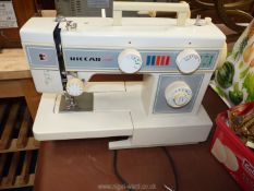 Riccar electric sewing machine in soft case.