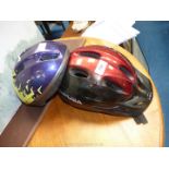 Two bike helmets.