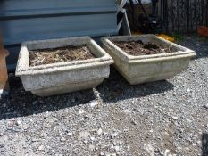 A pair of square concrete planters (one cracked), 20" x 59" x 10" high.