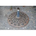 A large garden parasol/umbrella stand.