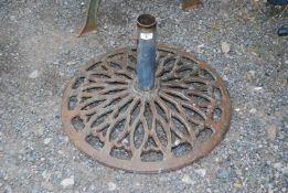 A large garden parasol/umbrella stand.