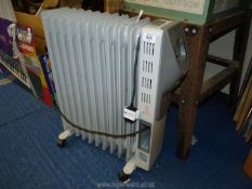 Blyss oil filled electric radiator.