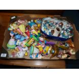 A quantity of toys to include; Smurfs, Disney, McDonald's, etc.