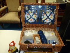 An Optima wicker picnic hamper and contents.