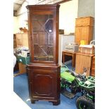 Reproduction corner cupboard with 13 pane glazed top door, 18" diameter x 72" high.