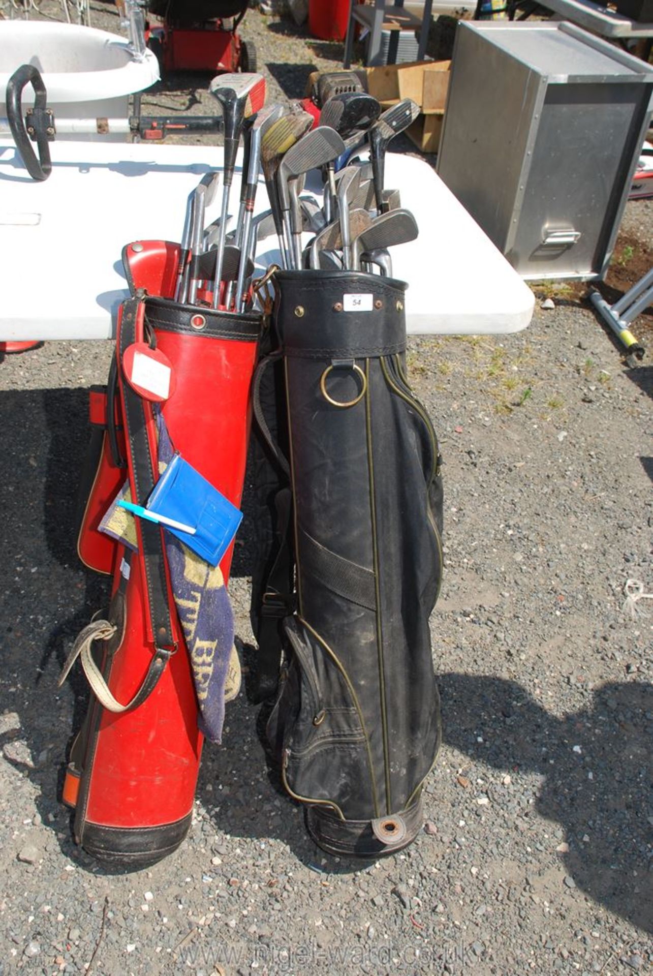 Two bags of golf clubs, Ben Sayers , John Letters.