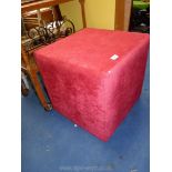 Red upholstered cube footstool 29".