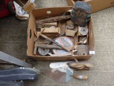 A box of mixed tools including. pointing trowels, belt drive wheels, hammers and picks etc.