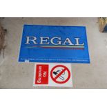 Regal Cigarettes advertising sign and No Smoking sign.