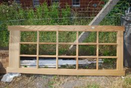 A pine unglazed interior door.