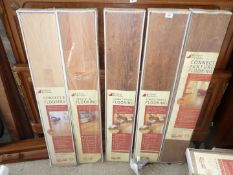 5 packs of Richard Burbidge wood effect flooring; 3 oak effect, 1 maple and 1 beech.