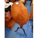 Small tilt top occasional table, split to top.