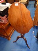 Small tilt top occasional table, split to top.