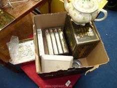 Box of video sets including. Black Adder etc., plus a teapot, ashtray etc.