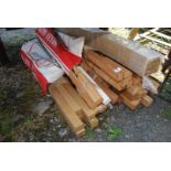 Two bags of wooden stair spindles