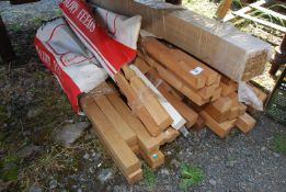 Two bags of wooden stair spindles