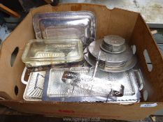 A box of plated items.