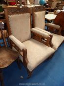 Pair of show frame hall chairs with beige upholstered seats and arm pads.