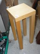 A tall Ikea wood effect occasional table/plant stand.