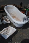 Resin roll top slipper bath with chrome feet, taps,