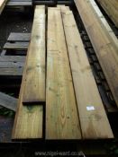 Twelve lengths of softwood up to 73'' long.