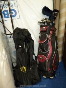 A Wilson golf bag with clubs including Sam Snead, Technique etc plus an Atlantic golf trolley.