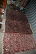 Three matching hearth rugs in red, cream and yellow colours, 54" x 27".