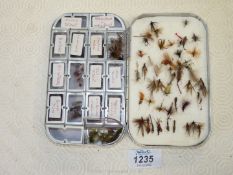 A vintage Wheatley alloy wet and dry Fly Box with glazed compartments and clips,