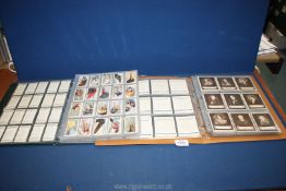 Two folders of Cigarette cards in full sets including Will's Cigarettes 'Cricketers',