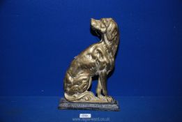 A brass and cast metal hound doorstop, 13" tall.