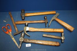 A quantity of vintage tools mostly hammers.