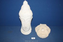 A concrete mask of the God of Wild Ancient Greece together with a tall concrete Buddha head 38 cms