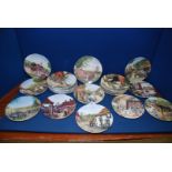 Twelve Doulton 'Country Crafts' wall plates and a quantity of Royal Doulton village scene plates.